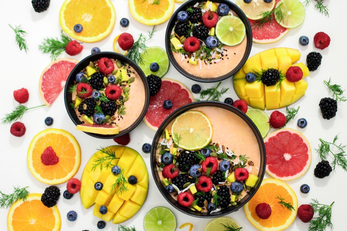 Fresh lemon slices used to balance flavors in a dish.